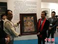 尼泊尔国宝级唐卡大师现身上海艺博会赠送精美画作
